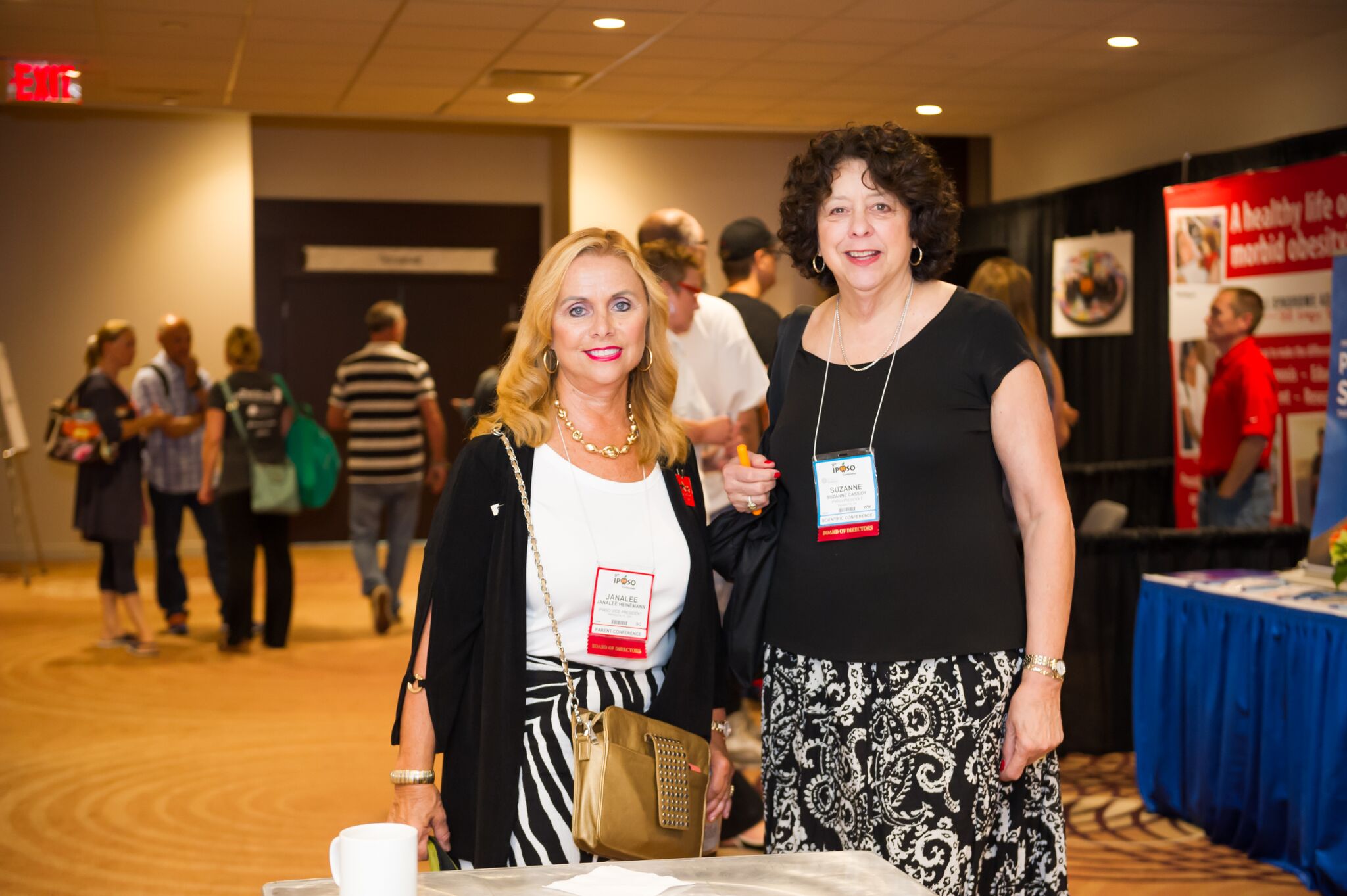 two females at conference