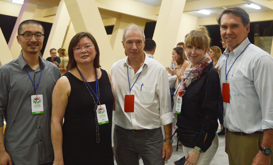 group of five people at a IPWSO conference